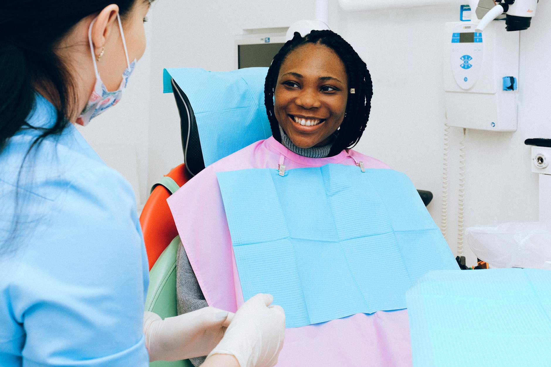 Dentist examining a patient's dental trauma emergency