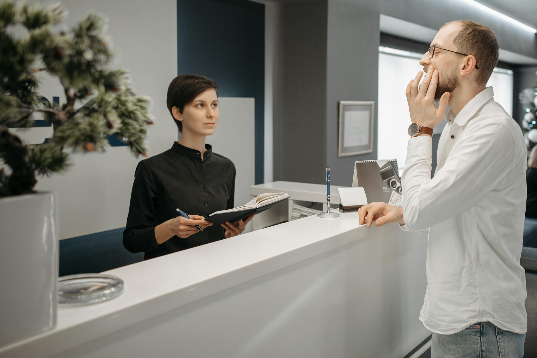 Dentist examining a patient's teeth for a dental abscess.