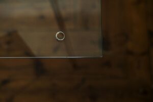 Dentist examining a patient's teeth, relevant to dental emergencies.