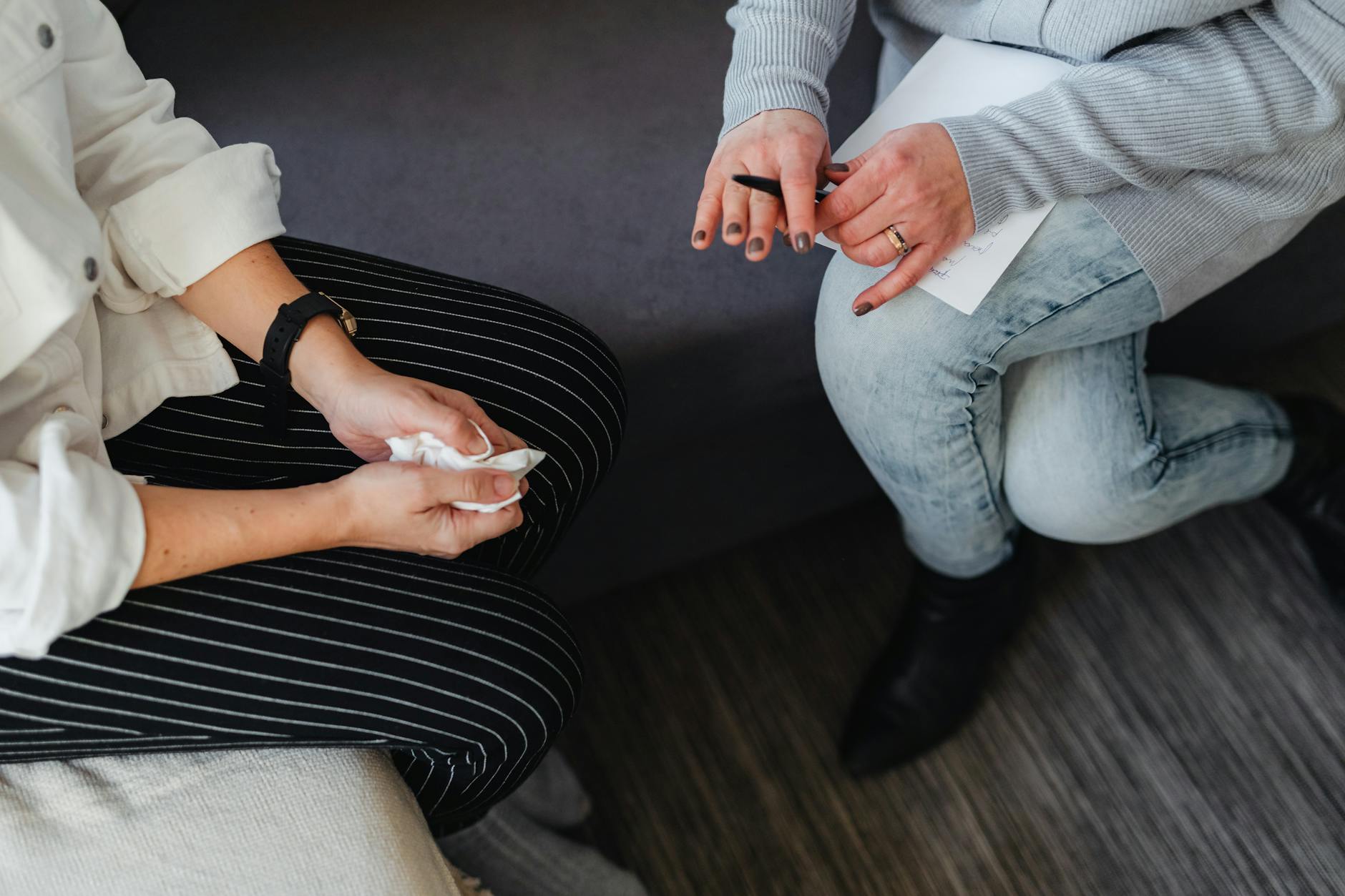 Dentist demonstrating tooth extraction on a patient